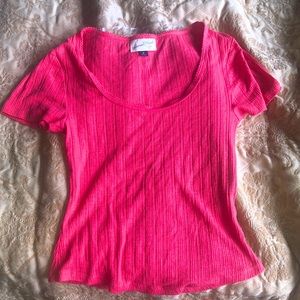 This is a regular pink t shirt and is very casual